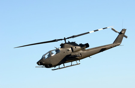 Vietnam War era helicopter in flight side viewのeditorial素材