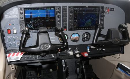 Miami, USA - March 7, 2009: State of the art Garmin G1000 avionics suite mounted on a light private propeller airplane. Manufacturers are making these options affordable to the private pilot.のeditorial素材