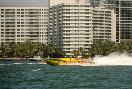 Miami, USA - September 11, 2011: Tourists enjoy a high speed thrill ride in the wayerways of Miami. Boating is a big tourists attraction for South Florida.のeditorial素材