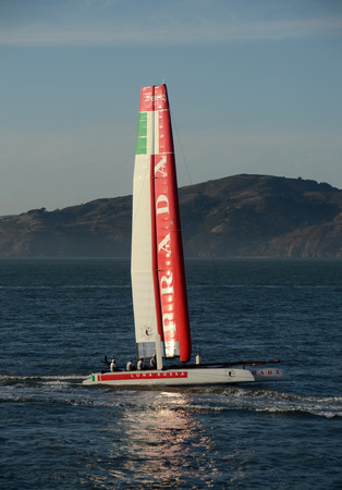 San Francisco, USA - October 2, 2012: America's Cup Luna Rossa catamaran sails in the San Francisco Bay prior to racing day. Luna Rossa is sponsored by Pradaのeditorial素材