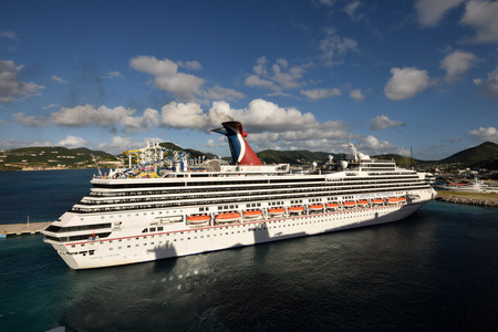 ST MAARTEN -  DECEMBER 24: Carival Sunshine cruise ship arrives in St Maarten, a popular cruise destination in the Caribbean on December 24, 2014のeditorial素材
