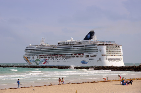 Miami, USA - Fenruary 26, 2012: Norwegian Pearl from Norwegian Cruises departing Miami on a Caribbean cruise. Miami is one of the busiest cruise ports in the world.のeditorial素材