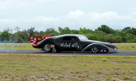 Titusville, USA - March 10, 2012: Jet car testing its engine prior to a race with jetfighter in Titusville, Fllorida. The car bears the name Wicked Willyのeditorial素材