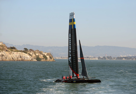 San Francisco, USA - October 4, 2012: Artemis Team sailboat performs practice runs for America's Cup in San Francisco, California. Artemis represents the Royal Swedish Sailing Clubのeditorial素材