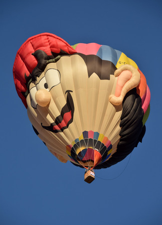 ALBUQUERQUE - OCTOBER 7: Special shapes hot air balloons take flight during the International Balloon Fiesta in Albuquerque NM on October 7, 2016のeditorial素材