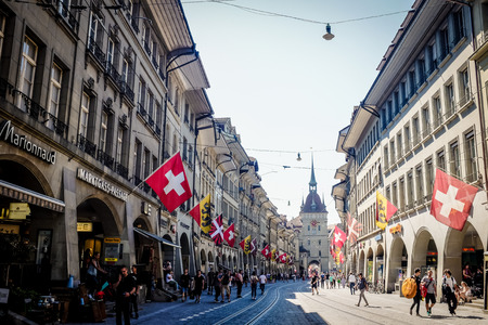 BERN, SWITZERLAND - MAY 26, 2017: A beautiful shopping street at the medieval city of Bern, the capital city of Switzerland.のeditorial素材