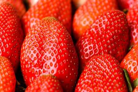 Background from freshly harvested strawberriesの写真素材