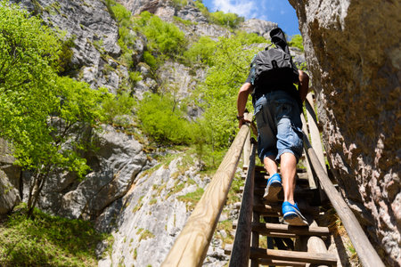 Mixnitz Barenschutzklamm, Styria / Austria - 18 05 2017: Waterfalls in Styria tourist attraction. Wooden bridge tourists on a hiking pathpathのeditorial素材