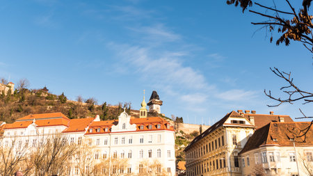 Graz, Styria / Austria - 20.01.2019: View at Schlossberg hill with fortress and clock-tower Uhrturm. Travel destination.のeditorial素材