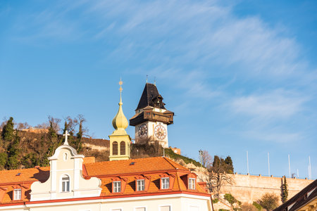 Graz, Styria / Austria - 20.01.2019: View at Schlossberg hill with fortress and clock-tower Uhrturm. Travel destination.のeditorial素材