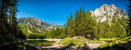 Gruner See, Austria - 18.08.2019: Lake in Alp destination in Styria, Austria between mountains and forests. Green Lake ( Gruner See ) Lake is known for emerald green water and constant water level changes. Famous travel destination.のeditorial素材