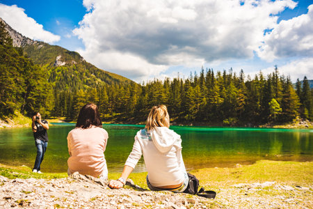 Gruner See, Austria 16.05.2017: Peaceful mountain view with famous green lake in Styria. Turquoise...