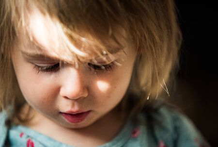 Portrait of very sweet little child with big eyes. 2 year old baby girl. Baby development concept....