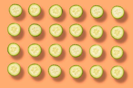 Fresh organic cucumber slices natural juicy pattern background. Beautiful green slices bright and vivid.の写真素材