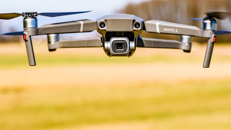 Graz, Austria 15.03.2020 - DJI Drone Mavic 2 Pro with Hasselblad camera flying in rural area. Copy spaceのeditorial素材