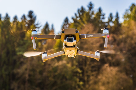 Graz, Austria 15.03.2020 - DJI Drone Mavic 2 Pro with Hasselblad camera flying in rural area. Copy...