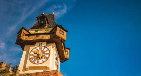 Graz, Austria - 10.03.2020: Uhrturm landmark in Graz cityscape view, Styria region of Austria....