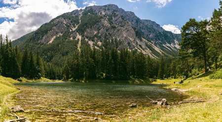 Tragoess, Styria, Austria - 12.07.2020 A beautiful lake called Green Lake, Gruner See. Tourist spot filled with tourists walking around the lake.のeditorial素材