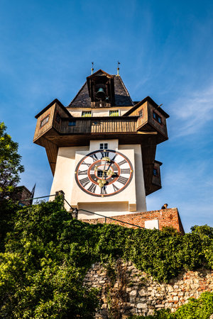 Graz, Austria - 13.07.2020: The clock tower, Uhrturm in City. Famous historic structure on summer...