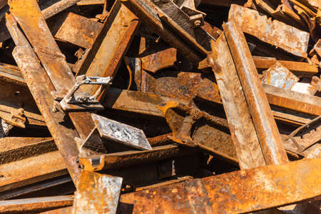 Rusted railroad tracks at a scrap yard