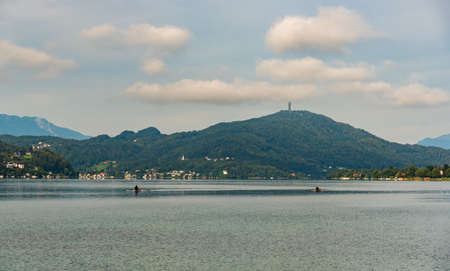 Klagenfurt, Austria - Great lake Klagenfurt am Worthersee. Recreation and water sports place. Summer holiday resort of many European tourists. Crystal clear water.の写真素材