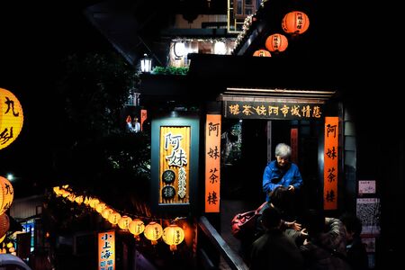 New Taipei City, Taiwan - Jan 02 2018: Ambiance of Jiufen Old Street including A-Mei Teahouseのeditorial素材