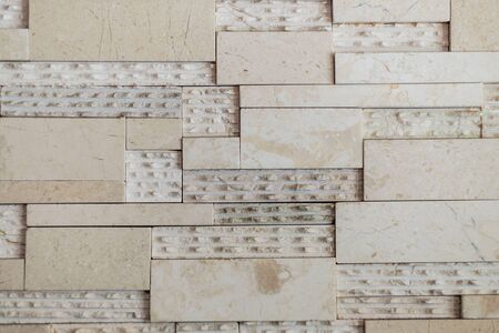 Modern contemporary style stone lined up with granite walls. Granite mixed with brick stone walls
