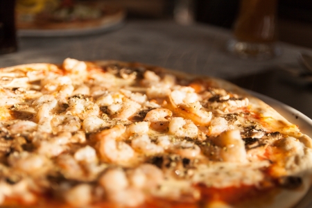 Pizza with shrimps and mushroomsの写真素材