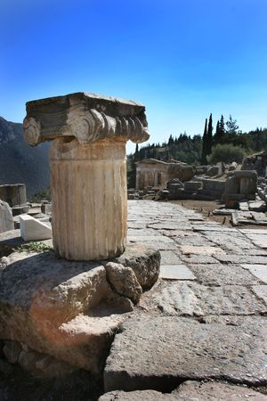Detail of column in the stone-tiled path to the Temple of Apollo in Delphi archeological site, Pelopponese, Greeceの写真素材