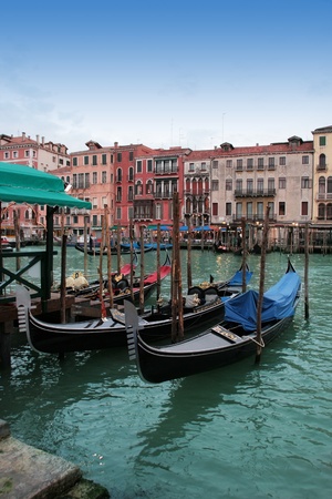 Venice: Traditional gondola waiting for a romantic ride, near Canal Grande and Rialto bridge.の写真素材