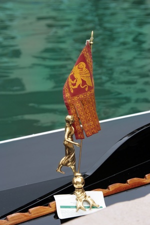Venice: Traditional gondola waiting for a romantic ride, near Canal Grande and Rialto bridge.の写真素材