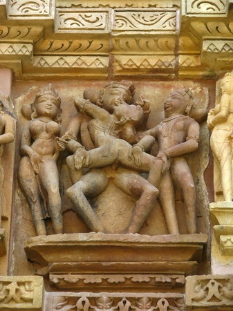 India: Temples of Khajuraho, one of the most popular tourist destinations in India, and famous for their erotic sculptures. Unesco World Heritage.の写真素材