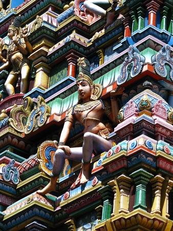 Varanasi (Benares), India: polychromed figures of hinduist gods on the roof of a temple.の写真素材