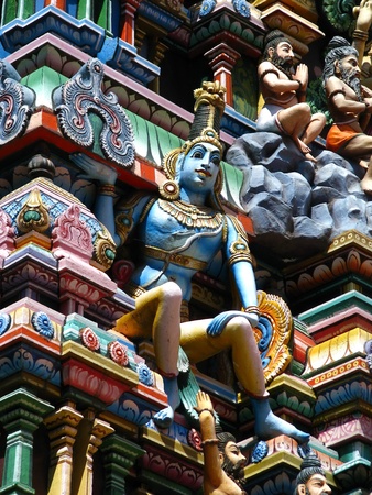 Varanasi (Benares), India: polychromed figures of hinduist gods on the roof of a temple.の写真素材