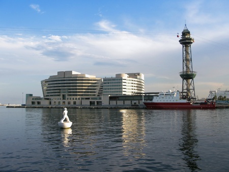 Barcelona Port  seaside view of World Trade Center and the old cable car tower, viewed from Rambla de Mar  Barcelona, Catalonia, Spain のeditorial素材