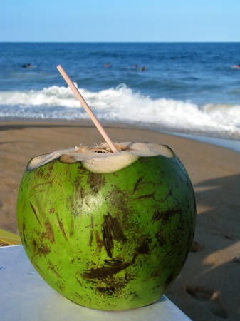 Porto de Galinhas, Brazil: green coconut drink in a gorgeous dreamy tropical beach.の写真素材