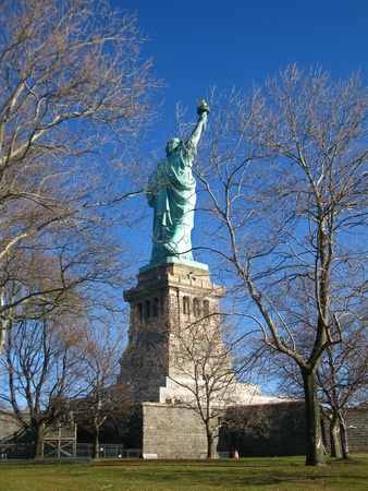New York  Unusual rear view of the Statue of Liberty, an American symbol  Liberty Island, New York City, USAの写真素材