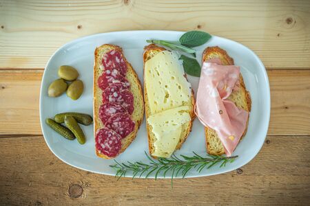 snack bread salami, cheese and mortadellaの写真素材