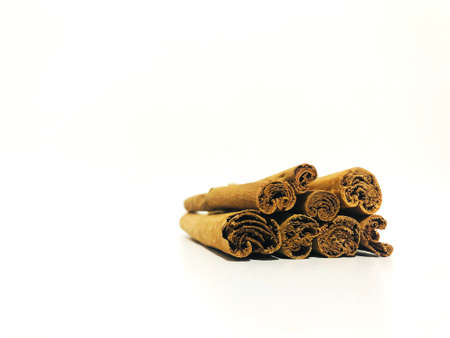 Fragrant cinnamon sticks on a white backgroundの写真素材