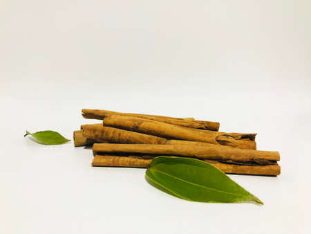 Fragrant cinnamon sticks on a white backgroundの写真素材
