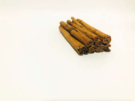 Fragrant cinnamon sticks on a white backgroundの写真素材