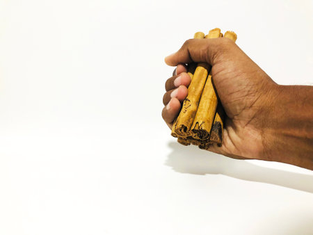 Fragrant cinnamon sticks on a white backgroundの写真素材