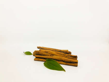 Fragrant cinnamon sticks on a white backgroundの写真素材