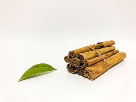 Fragrant cinnamon sticks on a white backgroundの写真素材