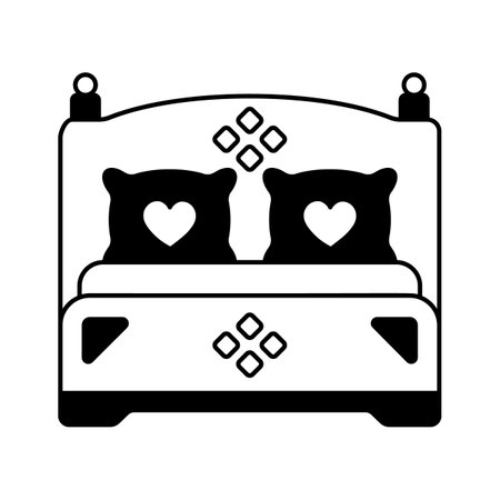 A decorated bed, symbolizing the newlyweds' first night togetherのイラスト素材