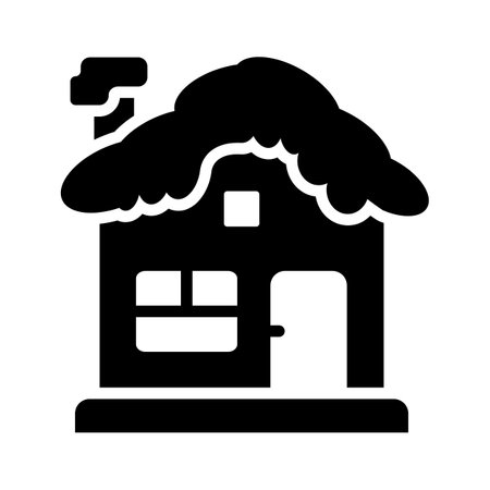 A house covered in snow, indicating winter conditions.のイラスト素材