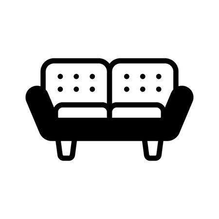 A stylish glyph icon of plush modern sofaのイラスト素材