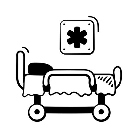 A hospital bed with adjustable features for patient care and comfort.のイラスト素材