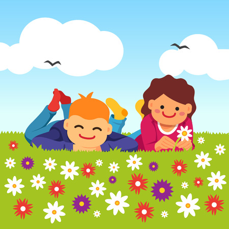 Happy kids laying on the meadow grass full of field flowers. Youth innocent platonic love. Young couple. Vector flat style isolated cartoon illustration.のイラスト素材