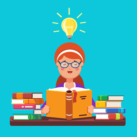 Young red hair girl student wearing glasses reading a book holding it in her hands having bright idea insight. Sitting at the desk with piles of books. Flat style modern vector illustration.のイラスト素材